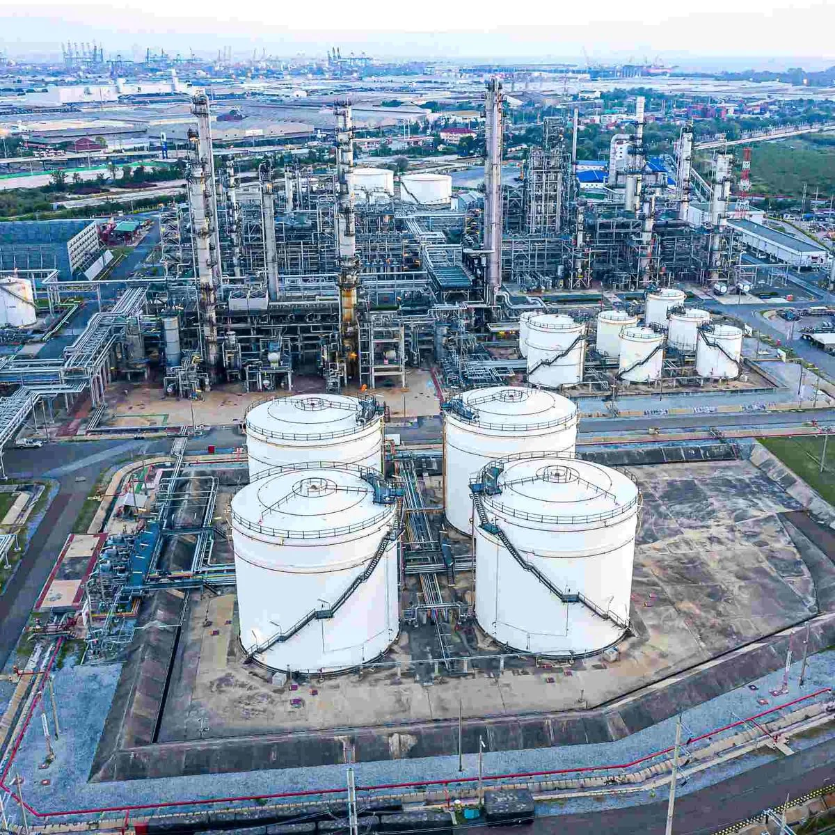 Large white propane storage spheres at an industrial facility