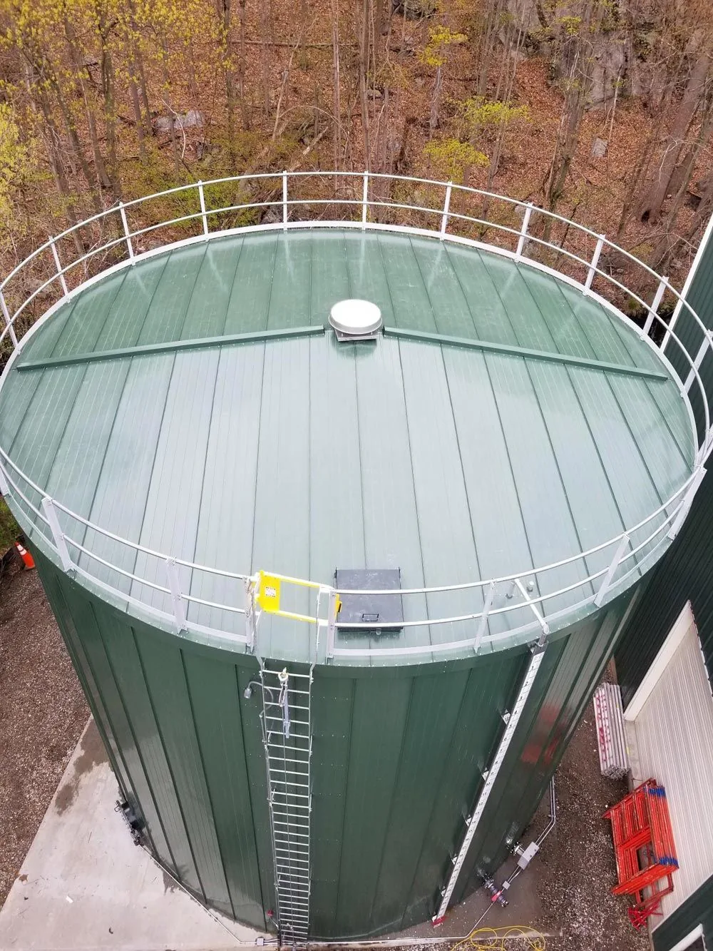 Industrial propane storage tanks used as a Get Propane Refill terms banner
