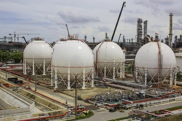 Industrial propane storage facility with large spherical tanks and piping