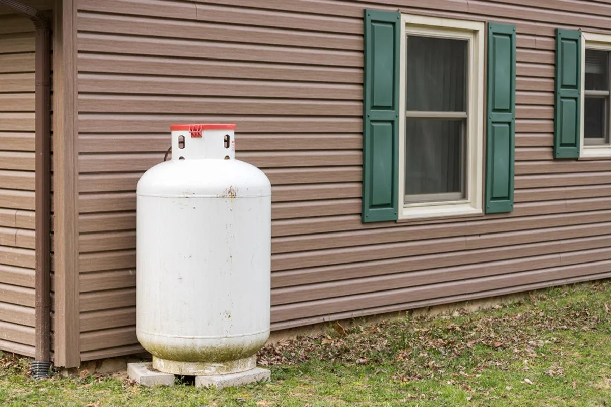 Propane tank beside a building for hospitality service planning